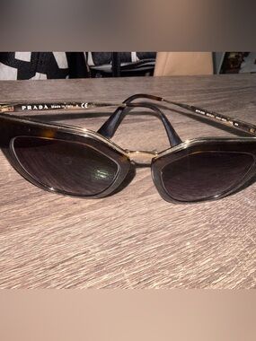 Prada Women’s Black Lensed Sunglasses with Gold Trim Prada Cinema SPR 53S